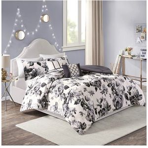 A black and white floral coverlet bedding set